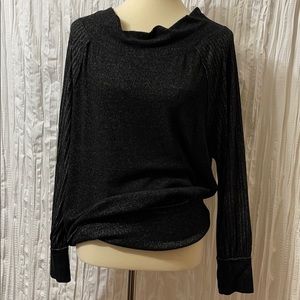 Dimvaloo slouchy fit off the shoulder sweater.
